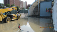 August 2019 - Pumping Stormwater to Treatment System After Heavy Rain and Repairing the Roll-up Door