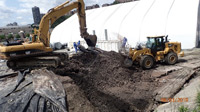 June 2019 - Transporting Stockpile into Tent (northwest corner of Quanta site)