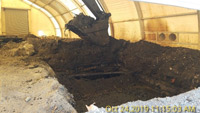 October 2019 - Pre-clearing Debris in Bulkhead Tent in Preparation for Soil Solidification 